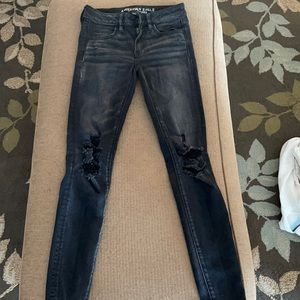 black super stretch tight ripped jeans AE